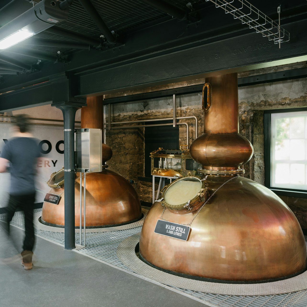 Discover the art of distilling at Holyrood Distillery where traditional methods meet modern flair. Experience the process behind gin and whisky production in a unique setting.